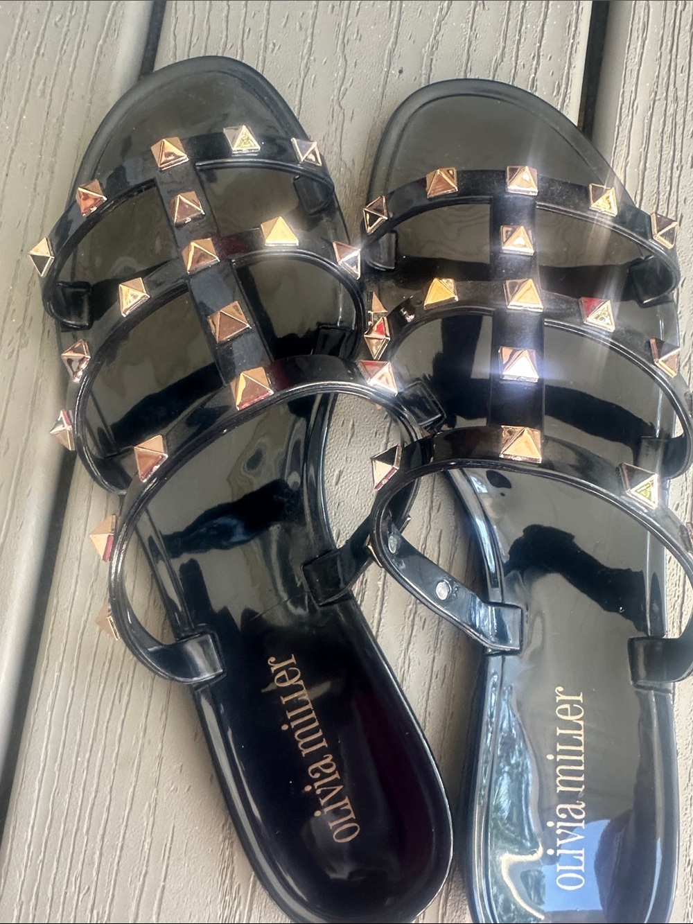 Olivia Miller Black Jelly Slide Sandals with Gold Pyramid Studs